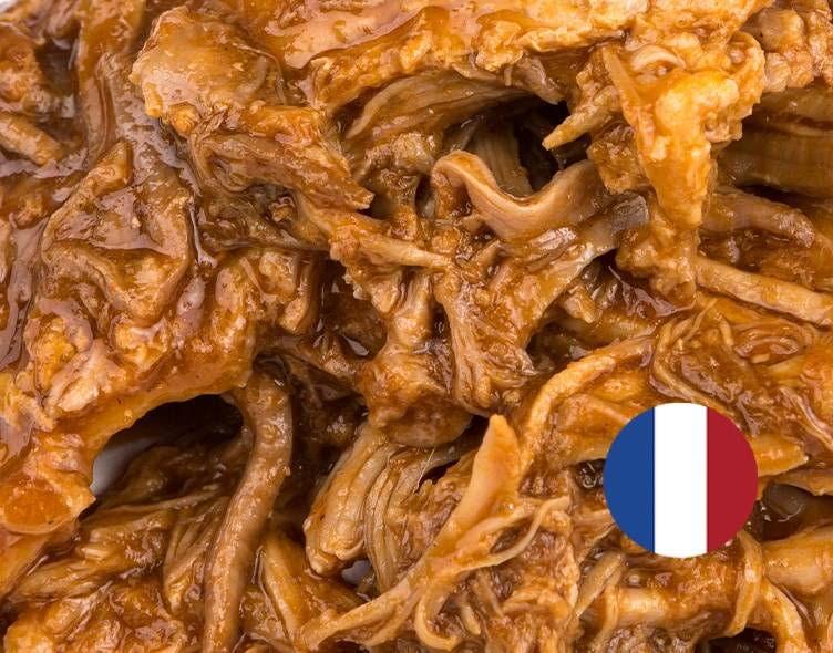 PORC BARBACOA: Our French pork, delicately shredded and cooked in a barbecue marinade, combining smoky and sweet flavors.